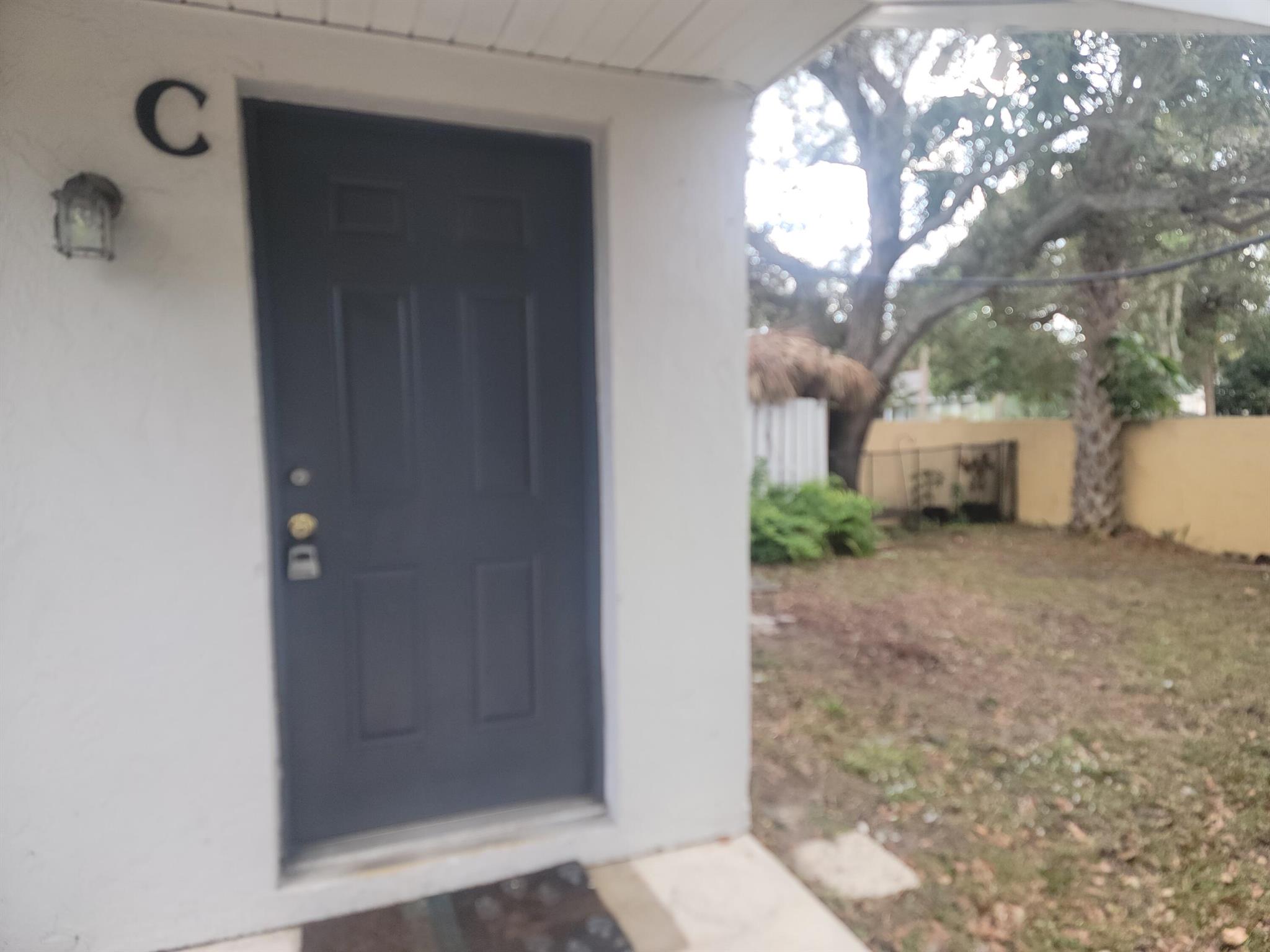 Move in ready! This one-bedroom with one and a half baths is great for investor or first time buyer! Roof 2023 and new AC October 2024, washer/dryer hookup inside. Tile throughout living area, kitchen and bath, brand new carpet in the bedroom. French doors to patio and private back yard. Public utilities and conveniently located to shopping and restaurants as well as historic downtown Ft Pierce and our beautiful beaches! All this at an affordable price! Must see!
