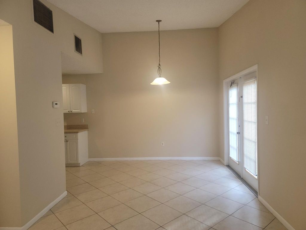 Photo of 2002 S 10th Street #Apt C, Fort Pierce, FL 34950 (MLS # R11106066)