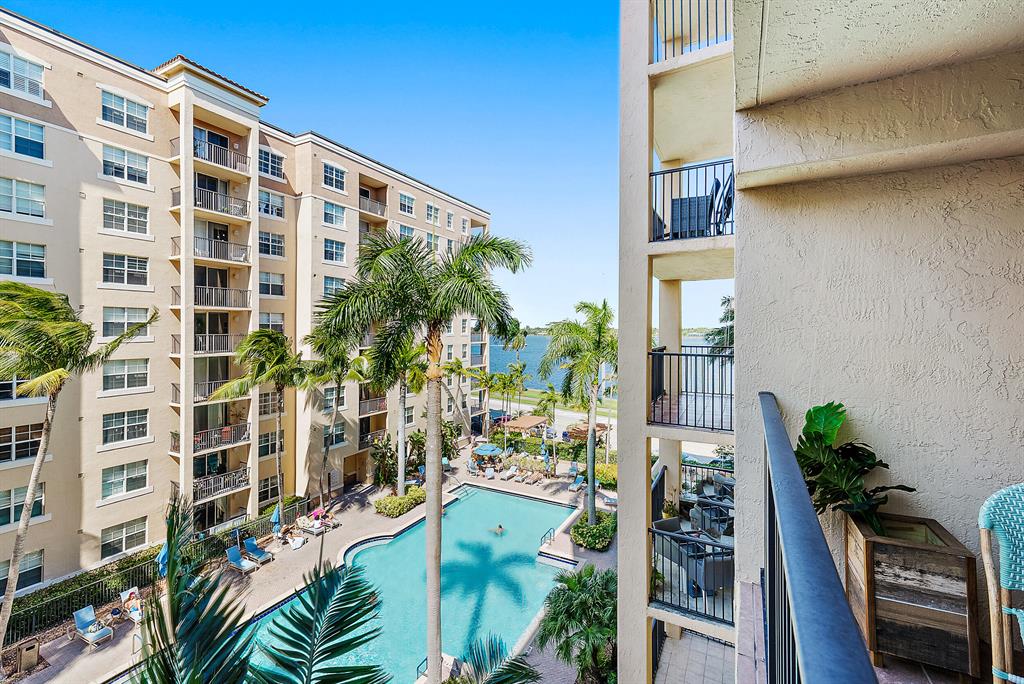 Welcome home to this beautiful, wood floored, intracoastal view, 1/1. Set in a prime location, steps to the water, blocks from downtown WPB with relentless access to dining, shopping, boating and Palm Beach island. Step outside for a stroll or bike ride to take in endless views of the Intracoastal Waterway. Large private balcony sits off the bedroom and over the pool. Washer/dryer in the unit, stainless steel appliances and granite counter tops, with renovated wood floors. **Additional storage unit on the floor with enough room for paddle boards, bikes and luggage**. 24 hour concierge and security, billiard room, sauna, resort style swimming pool, hot tub, outdoor dining kitchen and bar pool side, grill areas, putting green and business center.