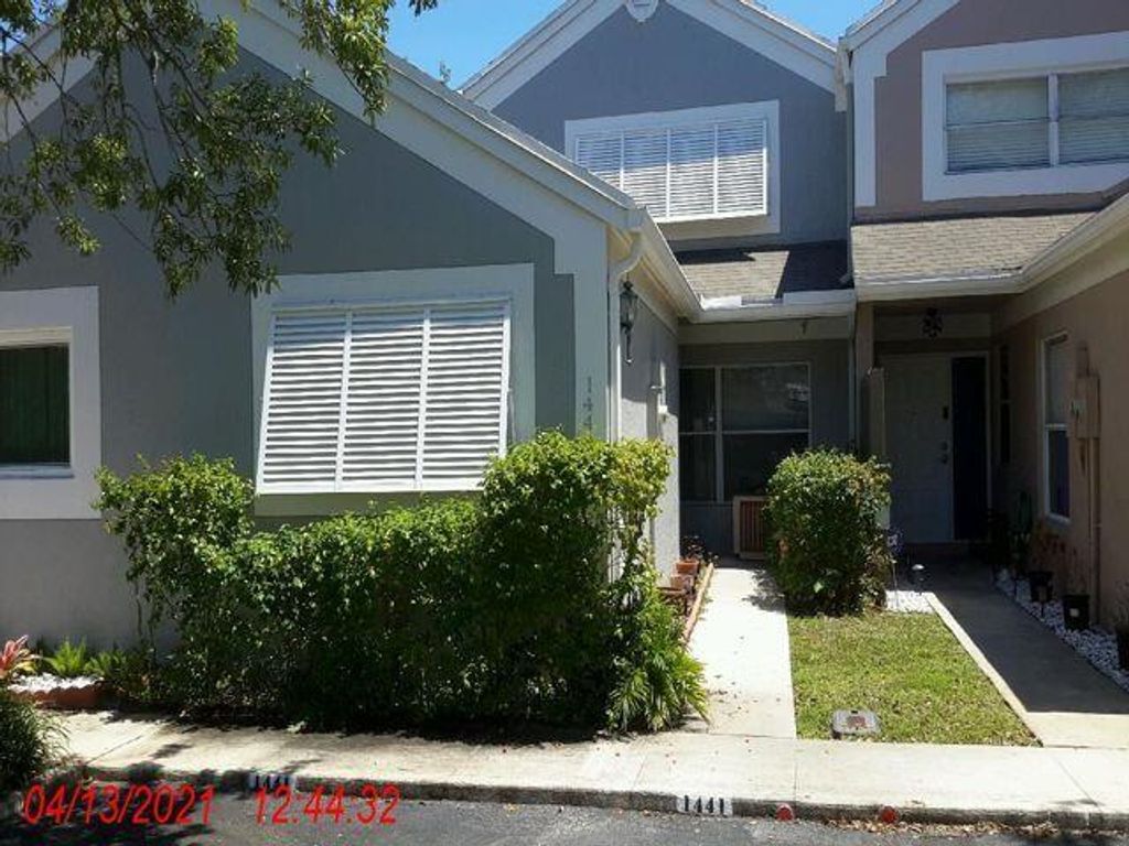 Photo of 1441 NW 122nd Terrace, Pembroke Pines, FL 33026 (MLS # B26004948)