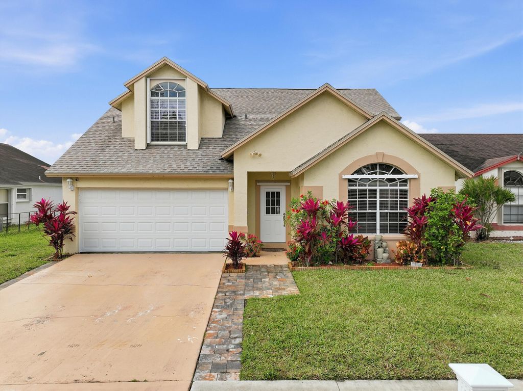 Photo of 2805 Foxhall Drive E, West Palm Beach, FL 33417 (MLS # R11160815)