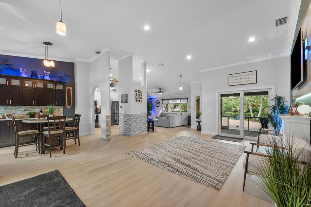 Photo of 100 Royal Court, Royal Palm Beach, FL 33411 (MLS # R11134568)