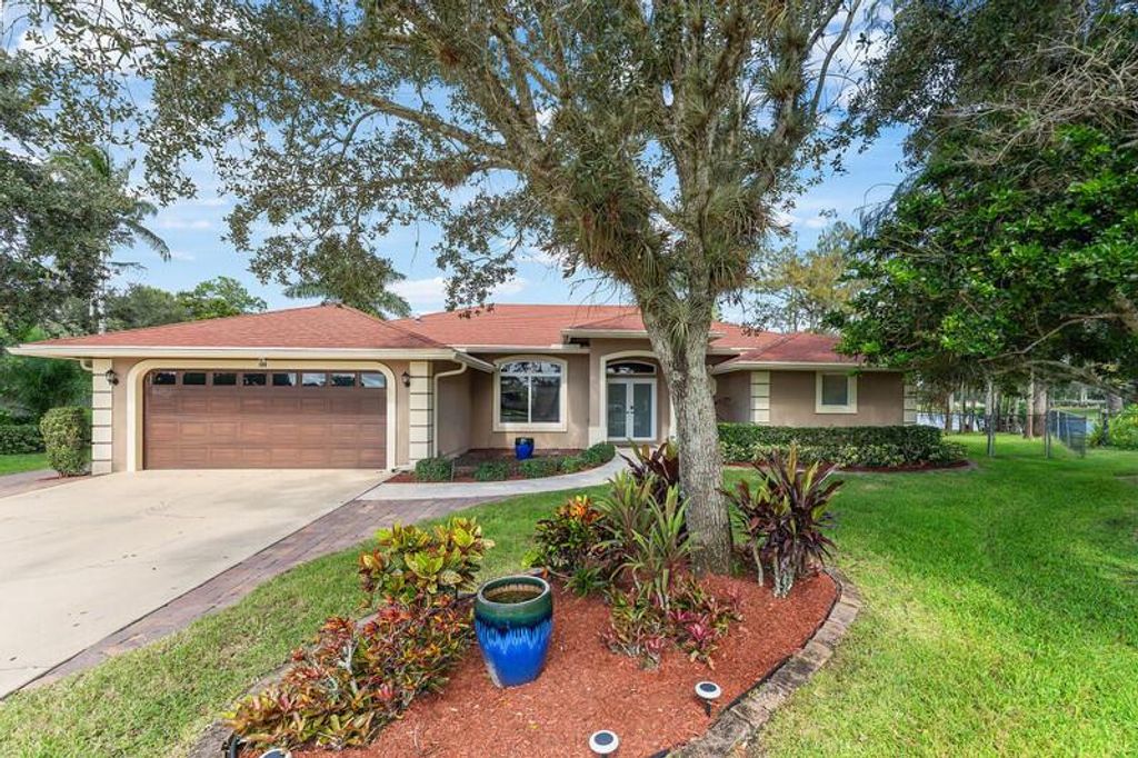 Photo of 100 Royal Court, Royal Palm Beach, FL 33411 (MLS # R11134568)