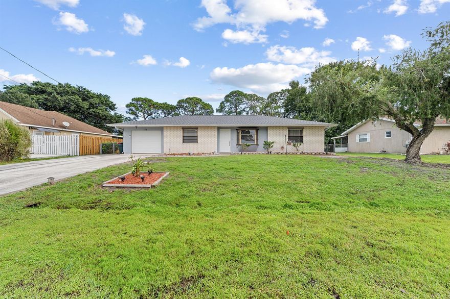Beautifully remodeled pool home in the heart of Port St. Lucie. This stunning 3-bedroom, 2-bath residence perfectly combines modern design, timeless quality, and Florida's relaxed coastal lifestyle. The open layout showcases a fully remodeled kitchen with gleaming granite countertops, brand-new stainless-steel appliances, and expansive cabinetry providing abundant storage. Both bathrooms are elegantly updated, and the brand-new roof (October 2025) offers lasting confidence and peace of mind. The expansive screened porch--one of the largest layouts of its kind--flows seamlessly to a large in-ground pool and outdoor kitchen with sink and waterline, ready for a fridge or icemaker. Ideally located near pristine beaches, Clover Park, Tradition Square, and the Botanical Gardens.