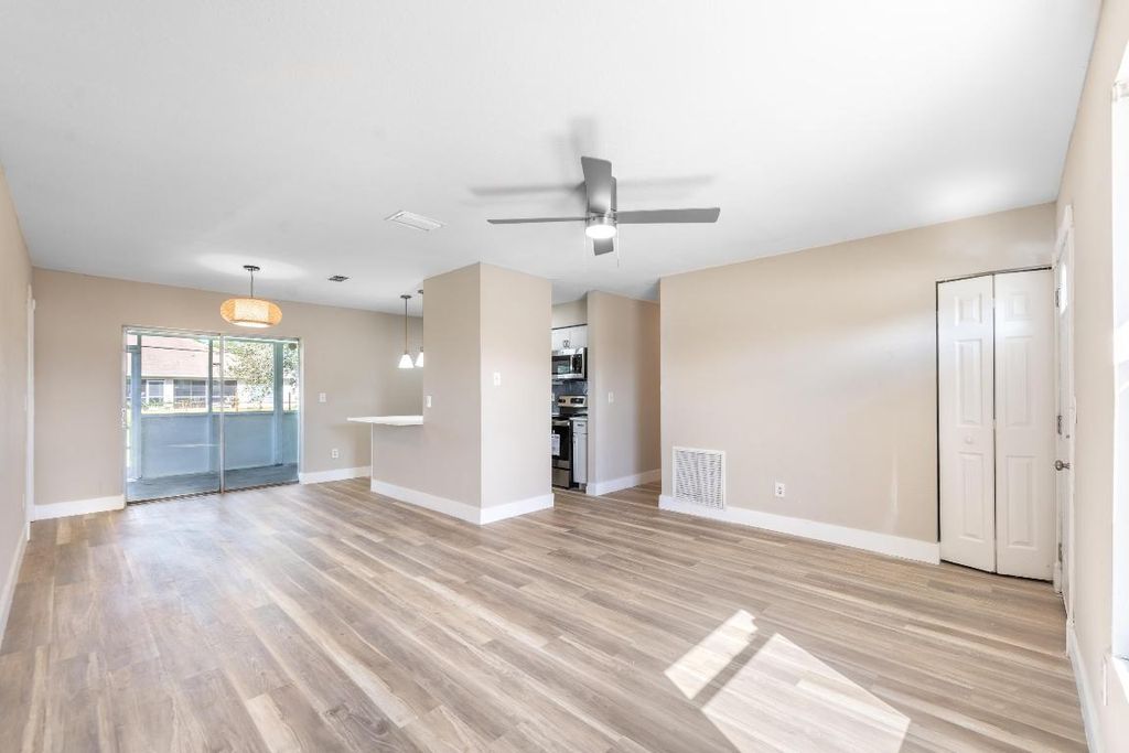 Photo of 1133 SW Sudder Avenue, Port Saint Lucie, FL 34953 (MLS # R10933321)