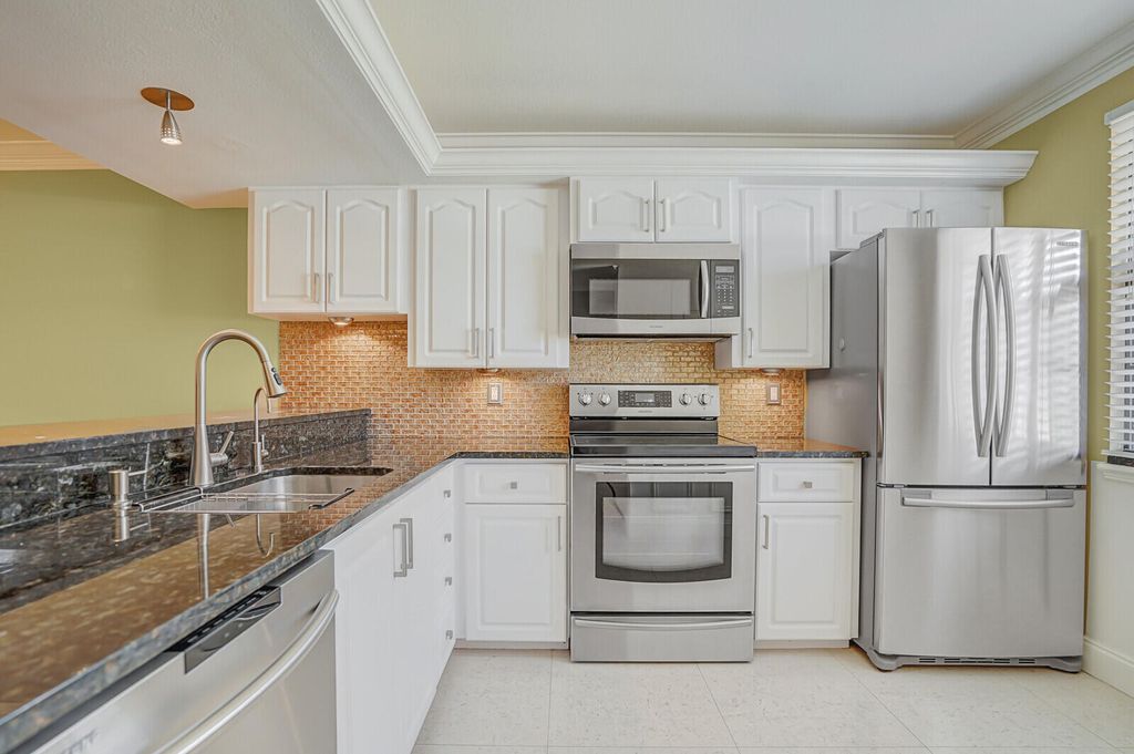 Photo of 6073 Balboa Circle #105, Boca Raton, FL 33433 (MLS # R11169674)