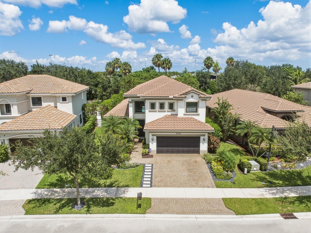 Photo of 10375 Cameilla Street, Parkland, FL 33076 (MLS # B26076514)