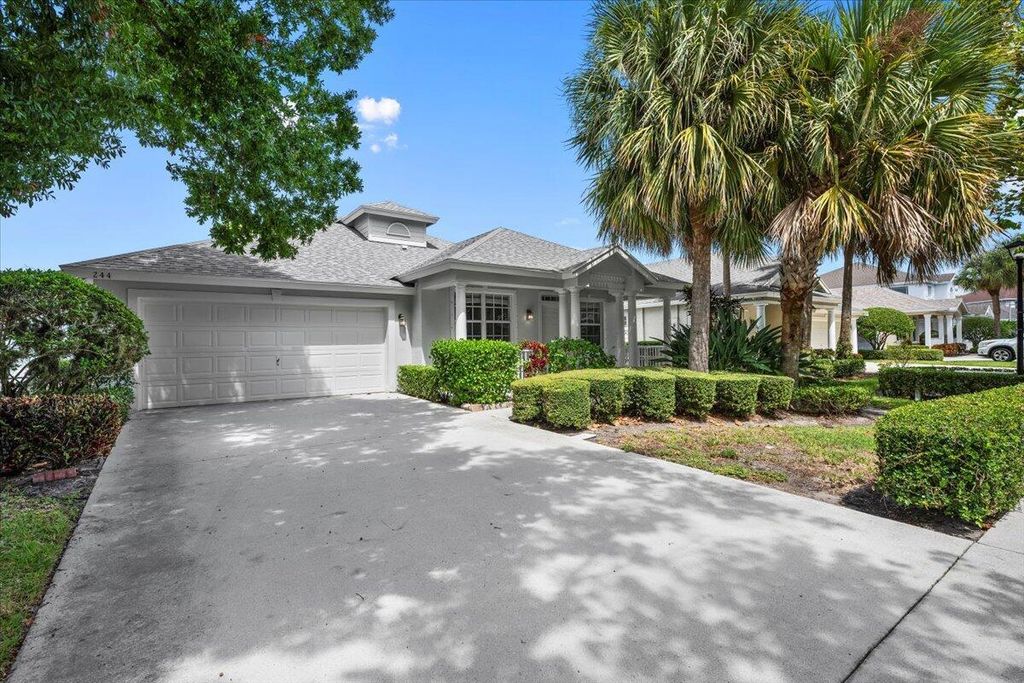Photo of 244 Clocktower Drive, Jupiter, FL 33458 (MLS # R11117469)