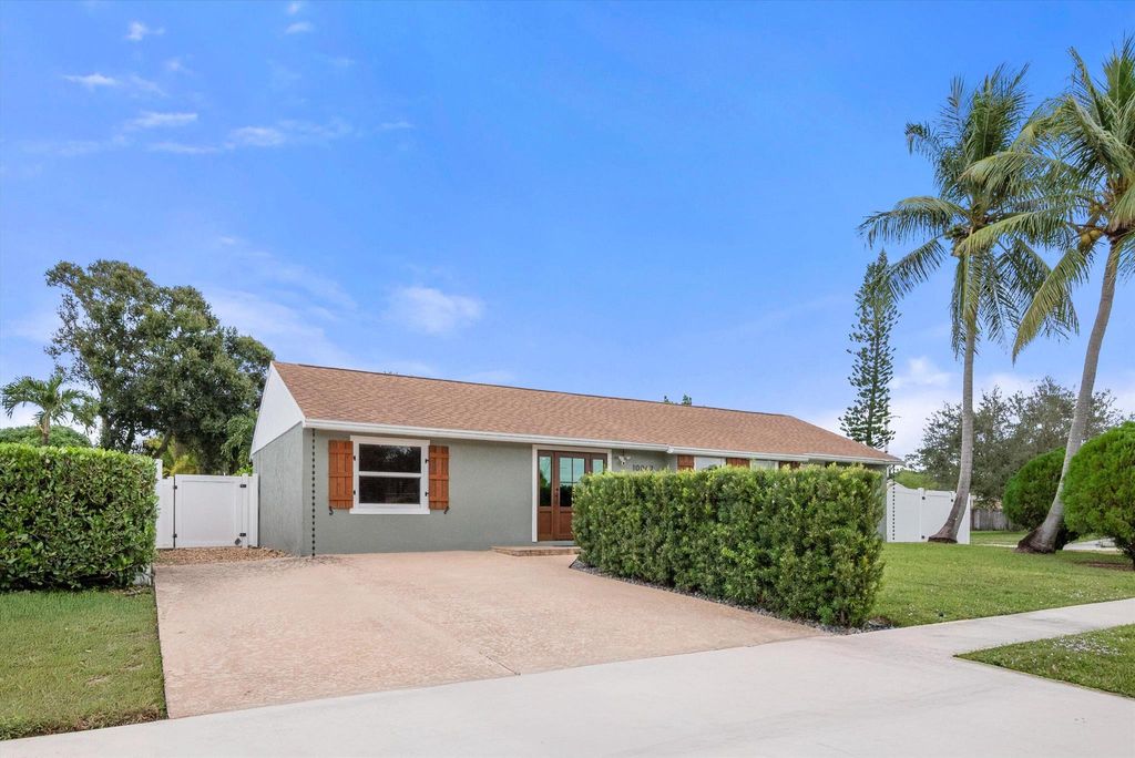 Photo of 10067 Yeoman Lane, Royal Palm Beach, FL 33411 (MLS # R11139194)