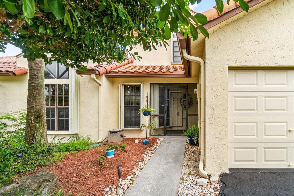 Photo of 18553 Woodstream Drive, Boca Raton, FL 33498 (MLS # R11103962)