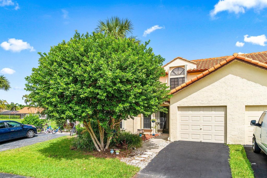 Photo of 18553 Woodstream Drive, Boca Raton, FL 33498 (MLS # R11103962)