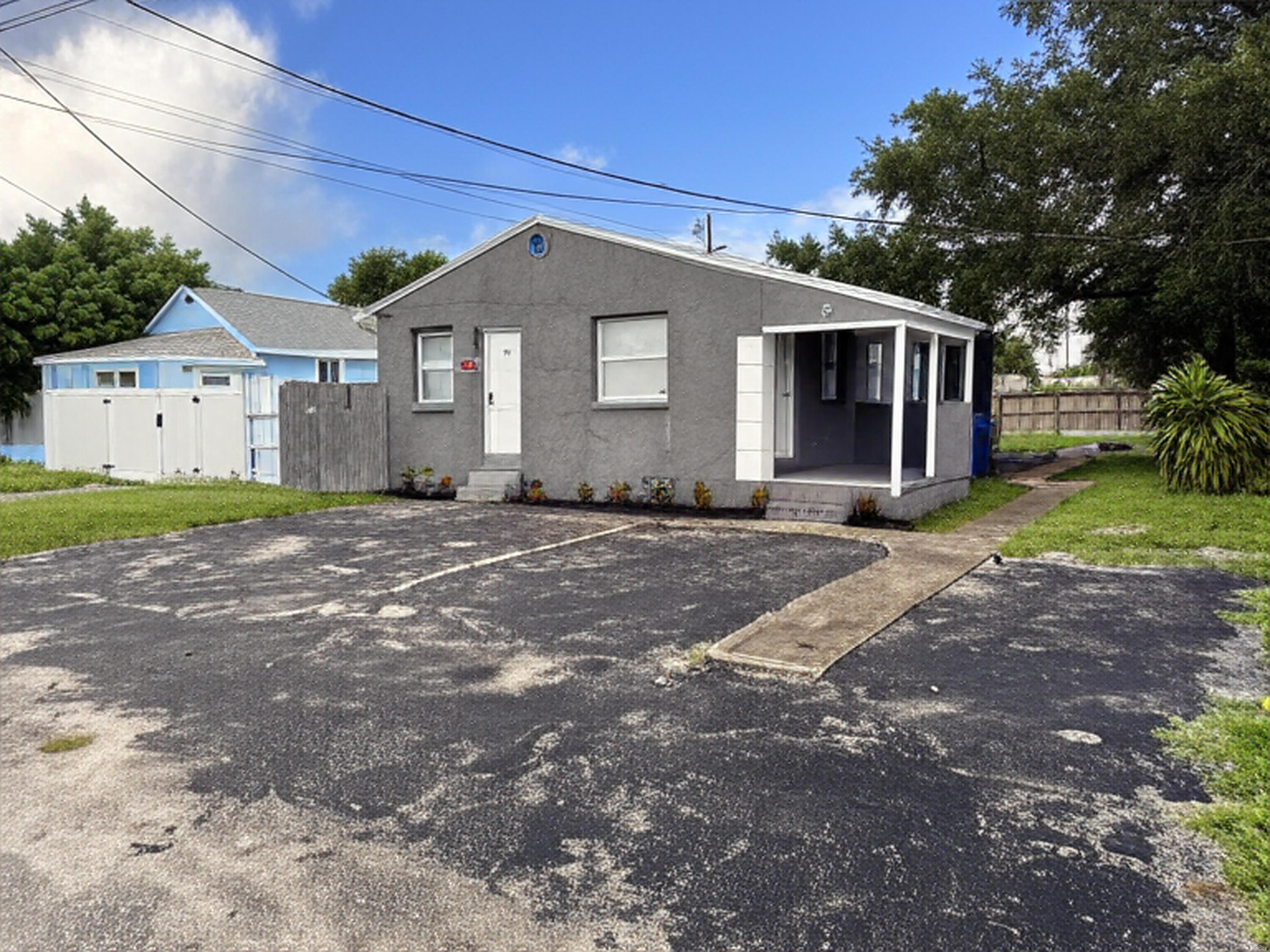 Welcome to your renovated 5-bedroom, 2-bathroom home in Riviera Beach! This house offers ample space with a brand-new kitchen, fresh paint, and new flooring.The fenced yard provides a private outdoor space with a shed for storage and laundry. Enjoy year-round comfort with central AC.The location is a major highlight, placing you within walking distance of the Intracoastal Waterway and minutes from the Riviera Beach Marina Village. Boating, kayaking, and fishing are right at your doorstep.Explore the beaches of Singer Island or the famous Peanut Island. With easy access to I-95, you're a short drive from the dining, shopping, and cultural attractions of West Palm Beach.This home is perfect for anyone seeking a comfortable, updated living space with a vibrant coastal lifestyle.