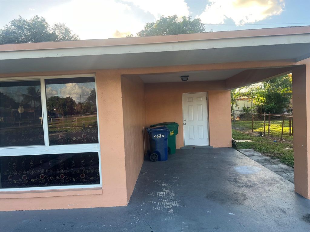 Photo of 1451 NW 33rd Ave, Lauderhill, FL 33311 (MLS # F10533276)