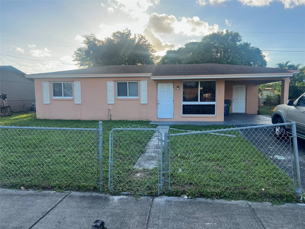 Photo of 1451 NW 33rd Ave, Lauderhill, FL 33311 (MLS # F10533276)