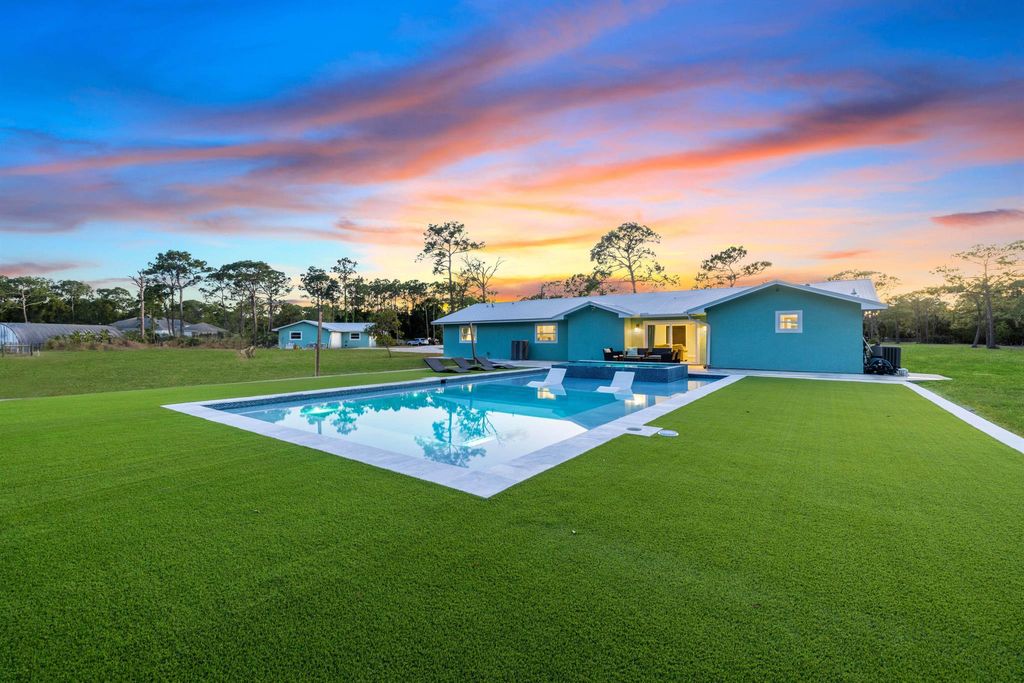 Photo of 3951 SW 42nd Avenue, Palm City, FL 34990 (MLS # R10984213)