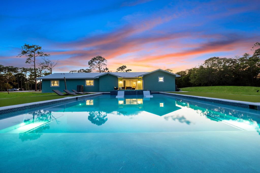 Photo of 3951 SW 42nd Avenue, Palm City, FL 34990 (MLS # R10984213)