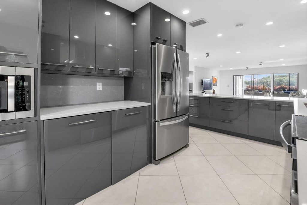 Photo of 33 Westgate Lane #C, Boynton Beach, FL 33436 (MLS # R11157271)