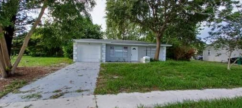 Photo of 235 NE Summer Road, Port Saint Lucie, FL 34983 (MLS # F10412525)