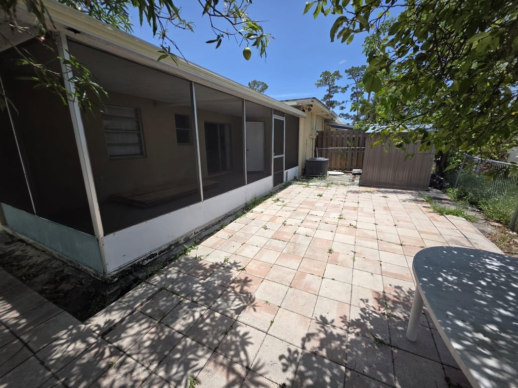 Photo of 978 Sumter Road W, West Palm Beach, FL 33415 (MLS # B26077486)