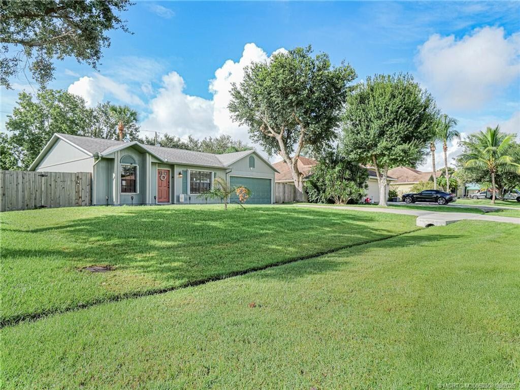 Photo of 1302 SW Century Avenue, Port Saint Lucie, FL 34953 (MLS # R11127444)