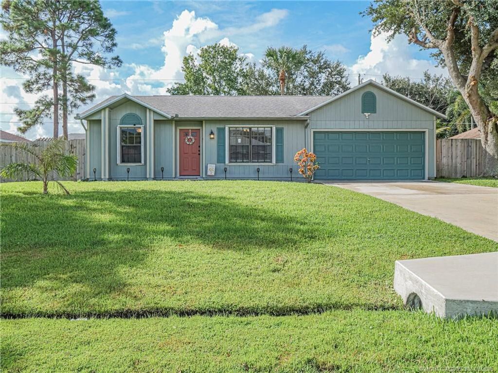 Photo of 1302 SW Century Avenue, Port Saint Lucie, FL 34953 (MLS # R11127444)