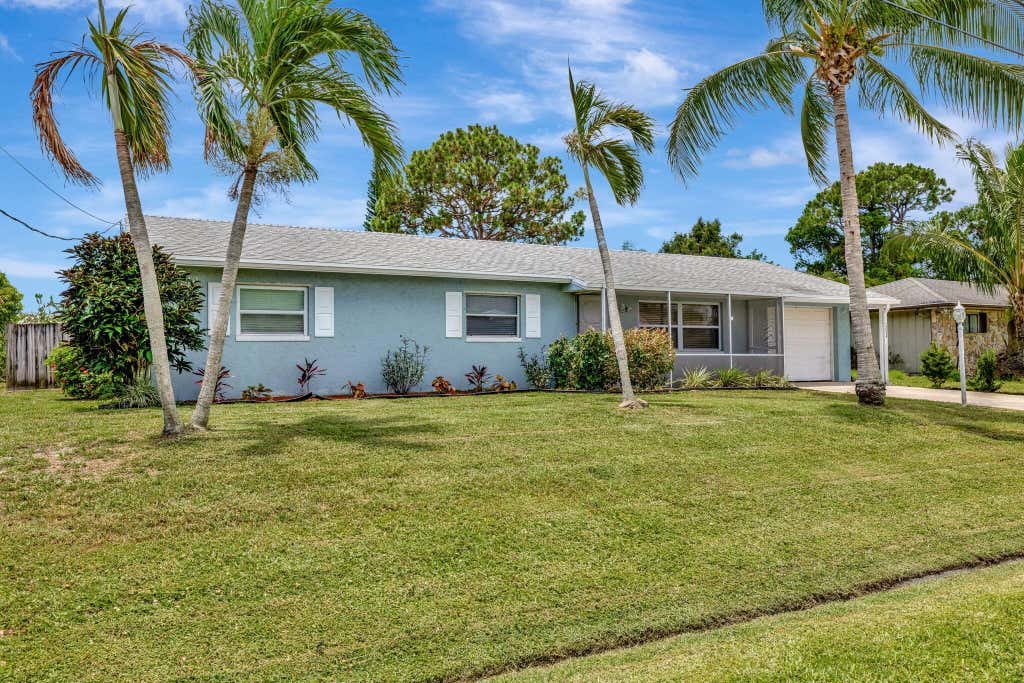 Photo of 1234 SE Petunia Avenue, Port Saint Lucie, FL 34952 (MLS # R11102278)