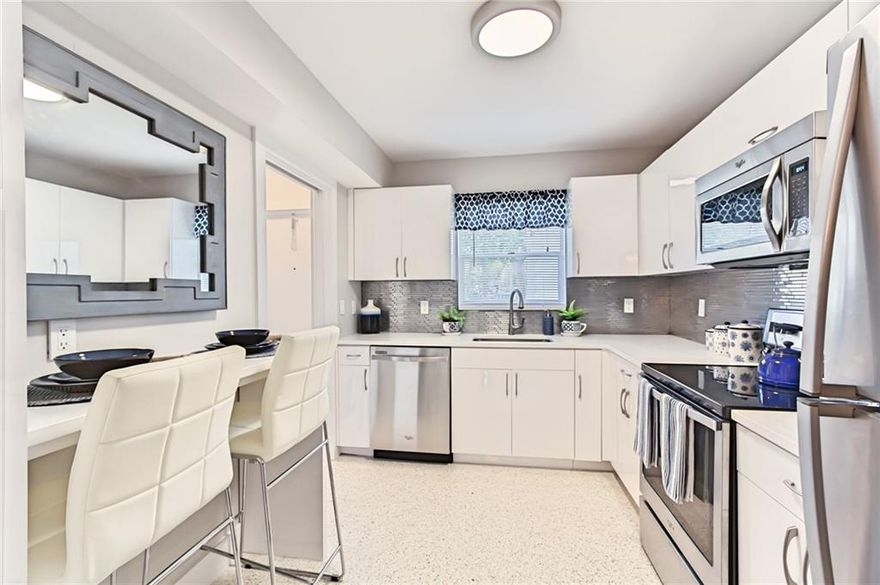 END UNIT ON SECOND FLOOR! LOTS OF NATURAL LIGHT IN THIS PROFESSIONALLY DESIGNED UNIT AT THE GARDENS. OUTSTANDING 2 BEDROOM/2 BATHROOM WITH DRAMATIC UPGRADES. NEW COUNTERTOPS, CABINETRY, AND APPLIANCES IN THE KITCHEN. EYE CATCHING LIGHTING AND FANS THROUGHOUT. LARGE BEDROOMS WITH PLENTY OF STORAGE, INCLUDING AN OVERSIZED WALK-IN MASTER BEDROOM CLOSET. THE BATHROOMS ARE EQUIPT WITH FLOATING WHITE VANITIES AND SEAMLESS SHOWER DOOR IN MASTER. ENJOY THE SOUTH FLORIDA WEATHER BY THE BEAUTIFUL HEATED POOL OR ON YOUR PRIVATE BALCONY. LANDLORD HAS JUST INSTALLED A POOL HEATER AND BBQ GRILL AREA ON PREMISES.