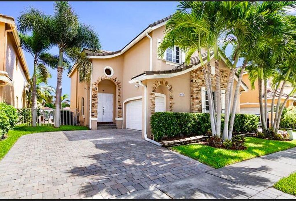 Photo of 4071 Coontie Court, Lake Worth, FL 33462 (MLS # R10873107)