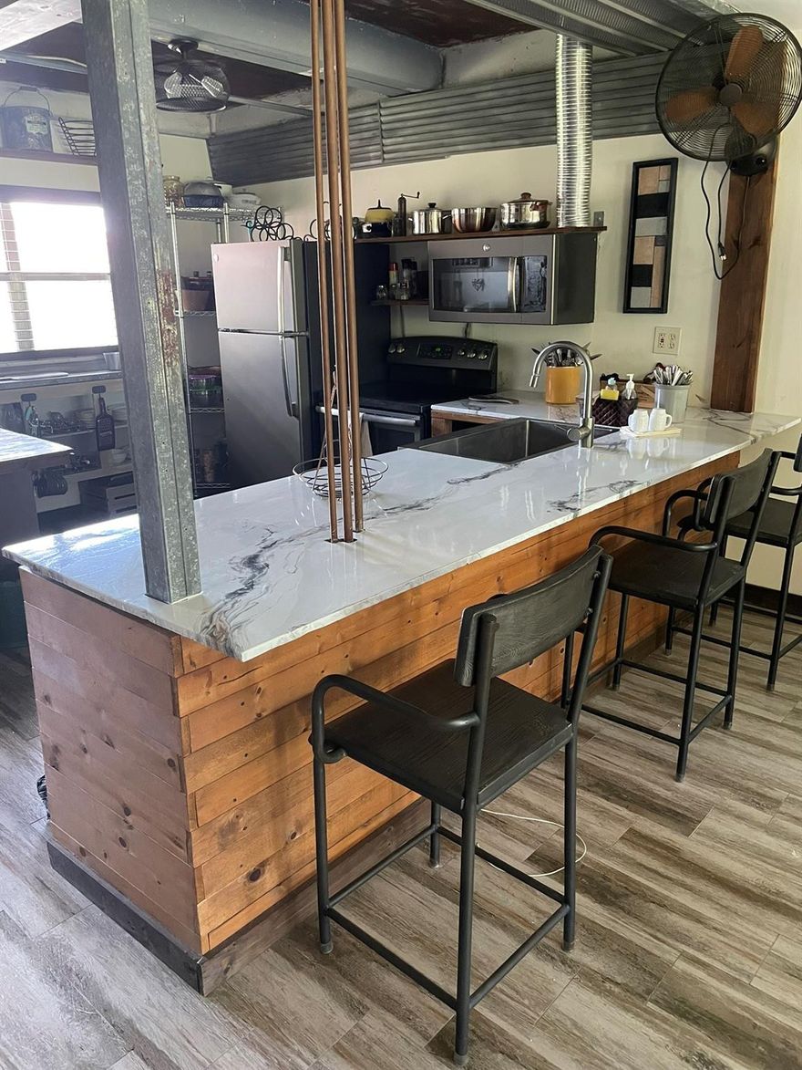 This is a rarely available 2/2 corner unit condo. Located at the 18th tee of Colony West's executive course it also has both lake and canal water views. The kitchen is newly renovated and open to the living room. A bedroom has been flexed to a sitting area creating a large space with exceptional views from all living areas and a walk-in closet has been converted to an office. The unit has new tile flooring, GE appliances, and a tankless hot water heater and will be sold partially furnished. There is a heated pool, shuffleboard, horseshoes, billiard room and community room in this 55+ community