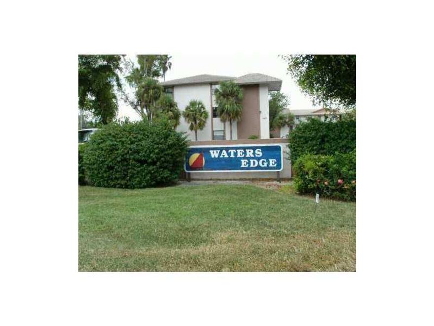Waters Edge peninsula Nestled in upscale neighborhood is this beautiful 2 bedroom 2 bathroom home with tile floors, freshly painted upgraded kitchen and baths. Washer & Dryer in unit. Surrounded with water close to shopping, restaurants, and bus & Sawgras s Expessway. Don't miss this is awesome home