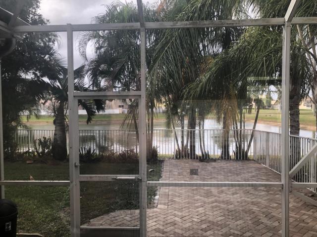 Photo of 147 KENSINGTON Way, Royal Palm Beach, FL 33414 (MLS # B26080745)