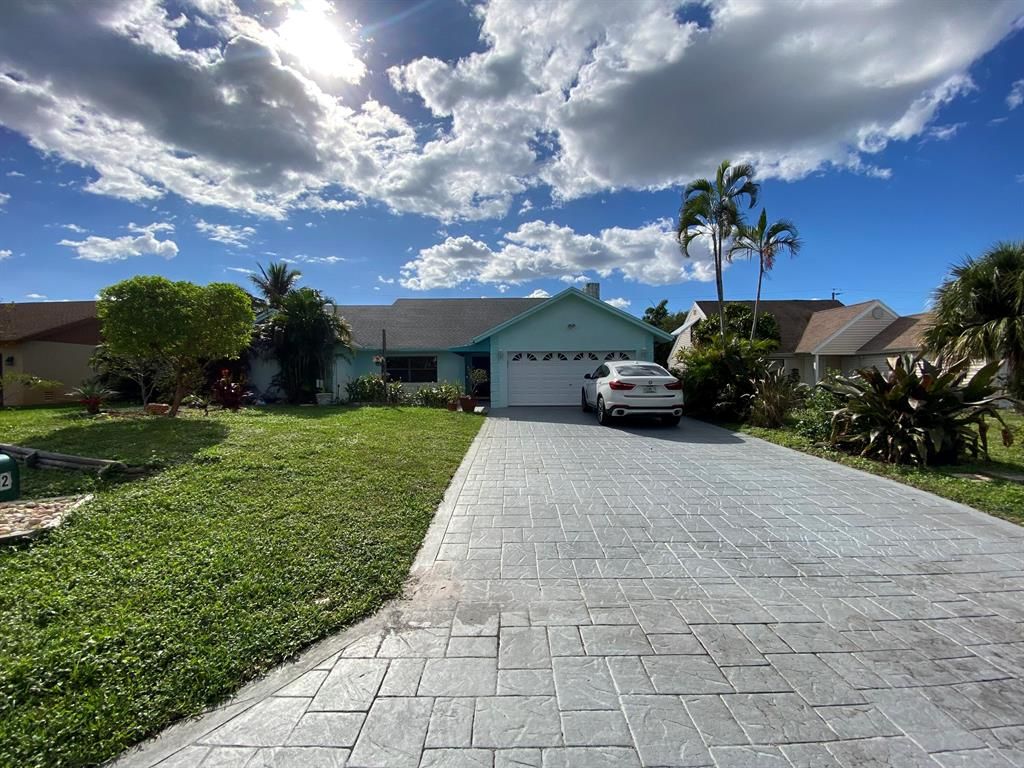 Photo of 702 Mallard Drive, Delray Beach, FL 33444 (MLS # R10766323)