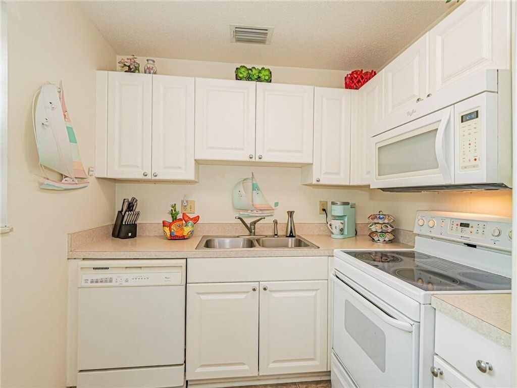 Photo of 12 Vista Palm Lane #103, Vero Beach, FL 32962 (MLS # R11166047)