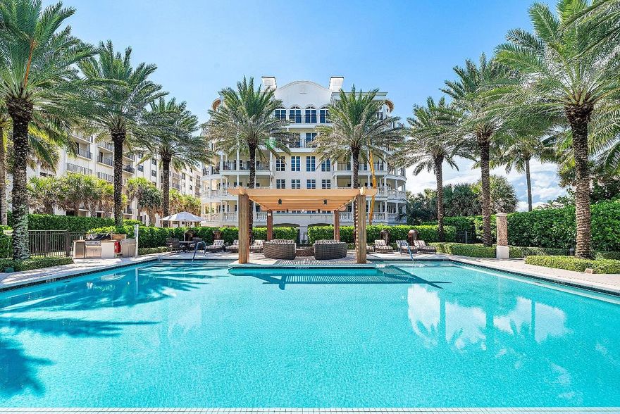 Experience refined coastal living in this stunning turnkey move-in ready penthouse at Dolce Vita. Showcasing panoramic views of the Atlantic Ocean and Peanut Island, this spacious 3-bedroom, 2.5-bath residence is a masterclass in modern design, creating the perfect quiet retreat.

Highlights include soaring 16-foot ceilings, a grand formal foyer, French and Italian finishes, and luxurious custom kitchen boasting Viking appliances. Additional upgrades include impact windows, plantation shutters, a whole-house water filtration system, upgraded A/C with HEPA filtration, and two secured garage spaces.

Dolce Vita is exceptionally dog-friendly, offering a dedicated pet area for residents, and provides private beach access for effortless seaside living. With only 34 residences, this boutique building is a hidden gem in the Palm Beaches that offers unmatched exclusivity and service. Nestled in Palm Beach Shores, it's within walking distance to world-class snorkeling and just a short drive to premier golf courses, shopping, and dining.