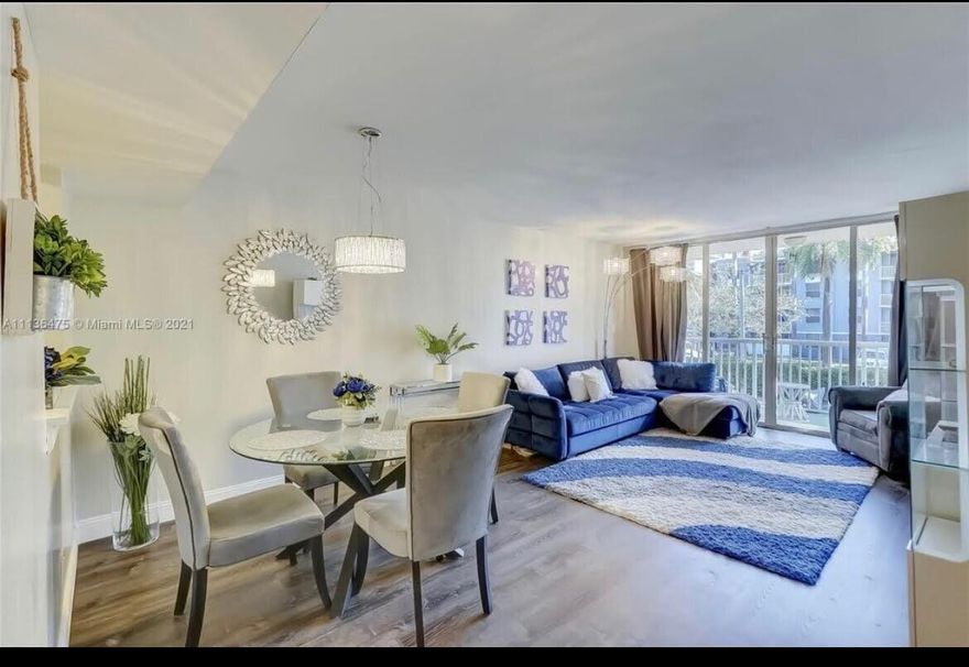 Beautifully renovated 1-BR corner residence in the heart of Dania Beach. This move-in-ready condo showcases a brand-new A/C and stylish, durable laminate flooring throughout. The updated kitchen features modern cabinetry, quartz countertops, and newer appliances, complemented by the convenience of an in-unit washer and dryer. Additional highlights include blackout shades, a spacious walk-in closet, and hurricane accordion shutters. Perfectly located just minutes from Fort Lauderdale-Hollywood International Airport, less than 10 minutes to downtown Fort Lauderdale, and approximately one mile from the beach. Enjoy the ultimate South Florida lifestyle with a Publix conveniently located right across the street—whether you prefer to walk, bike, or drive, everything you need is within reach.