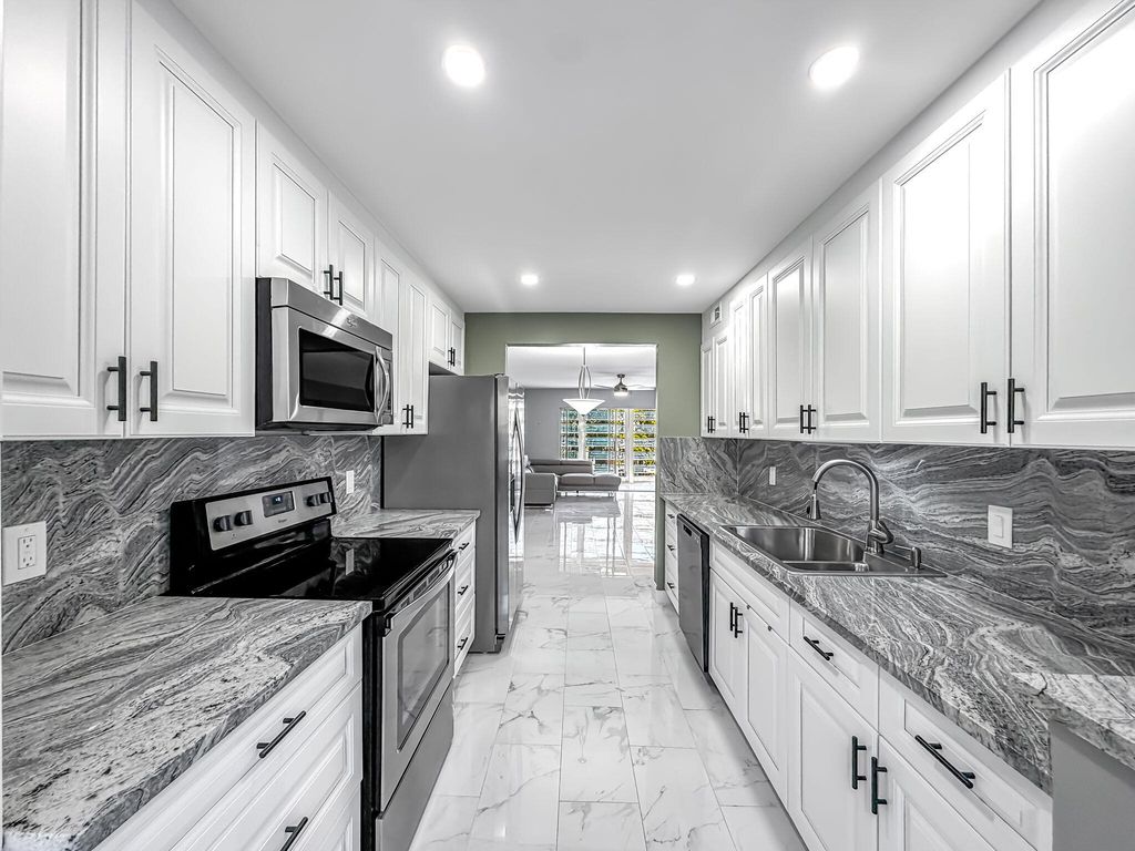 Photo of 1802 Eleuthera Point #E3, Coconut Creek, FL 33063 (MLS # R11166594)