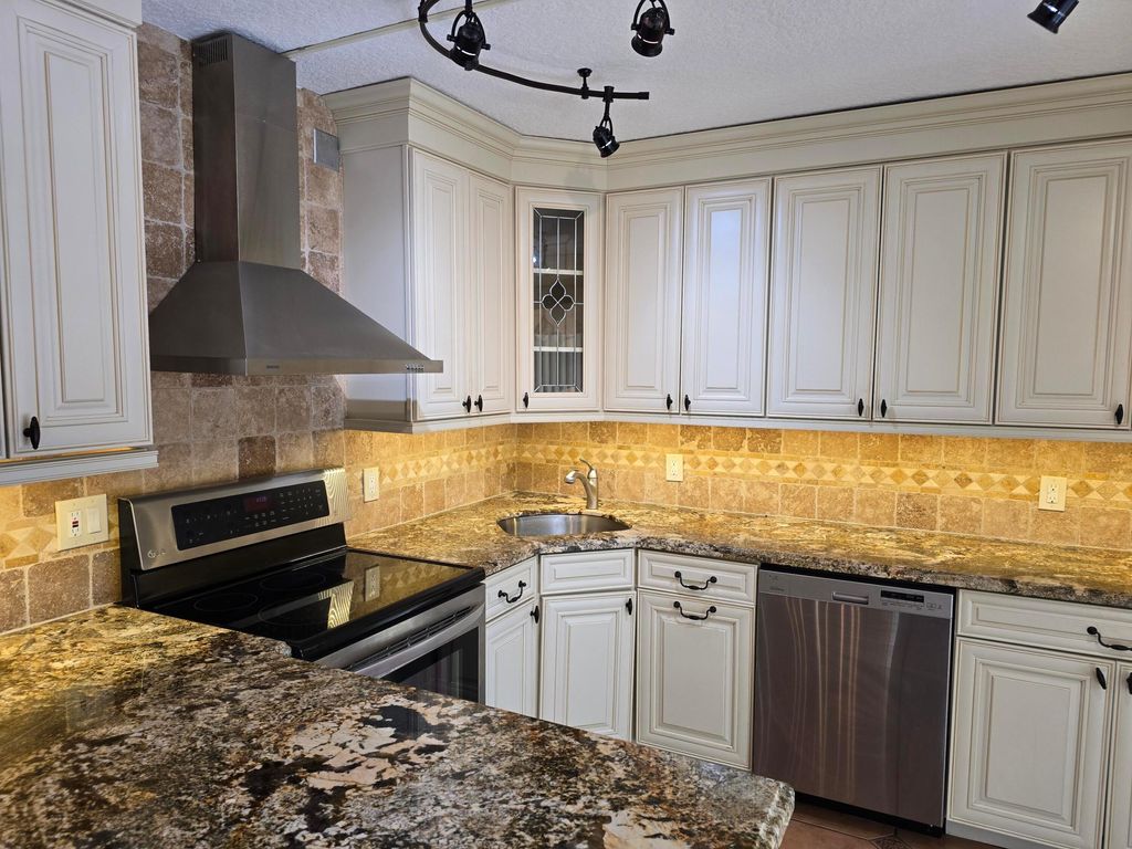 Photo of 1440 Augusta Circle #132, Delray Beach, FL 33445 (MLS # R11168651)