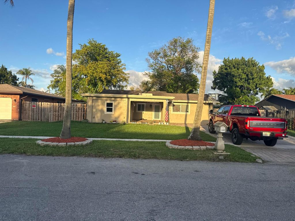 Photo of 8122 NW 73rd Avenue, Tamarac, FL 33321 (MLS # B26017011)
