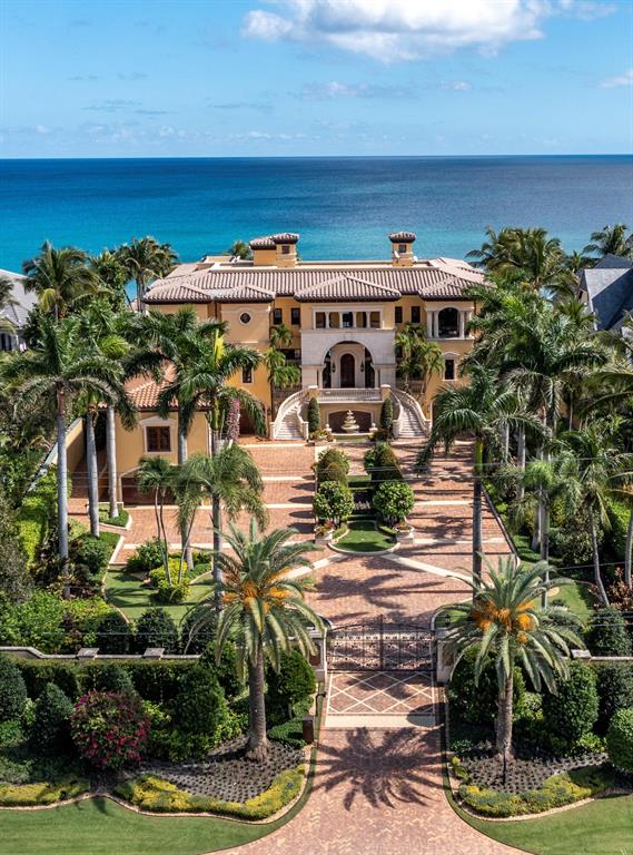 Gated Cap d'Antibes-inspired Oceanfront Estate sited on 120 +/- feet of beach frontage in ''Estate Section'' of prestigious Highland Beach... South Florida's Malibu on the Atlantic. An impressive motor plaza introduces this stately ocean mansion with butterfly staircase, impeccably finished public rooms, full wing primary suite, and six ultra-luxe en-suite guest bedrooms, media/screening room and executive oceanfront office. New club room wing with 6 bay auto museum. The lower level features a full wellness center with gym, massage room with full bath and an additional 7+ Bay garage for the car connoisseur. Iconic grand loggia for large scale-gatherings, resort-style pool, and private beach walk to an observation deck on the sand. Shown by appointment only.