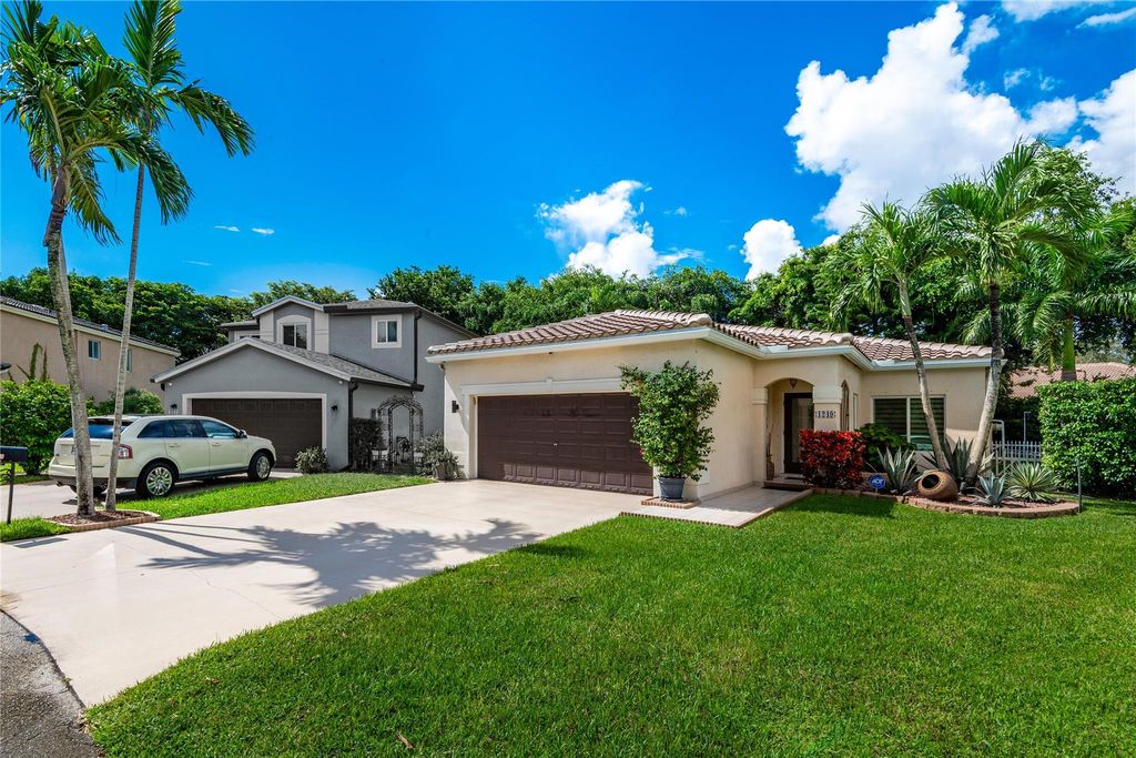 Photo of 1249 SW 46th Way, Deerfield Beach, FL 33442 (MLS # F10532159)