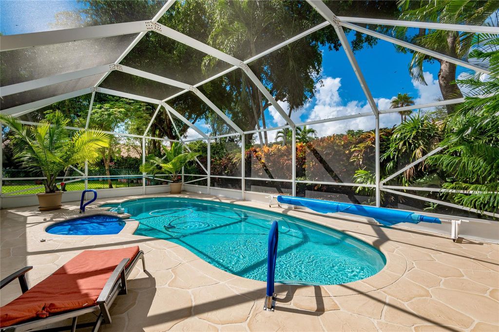Photo of 1249 SW 46th Way, Deerfield Beach, FL 33442 (MLS # F10532159)