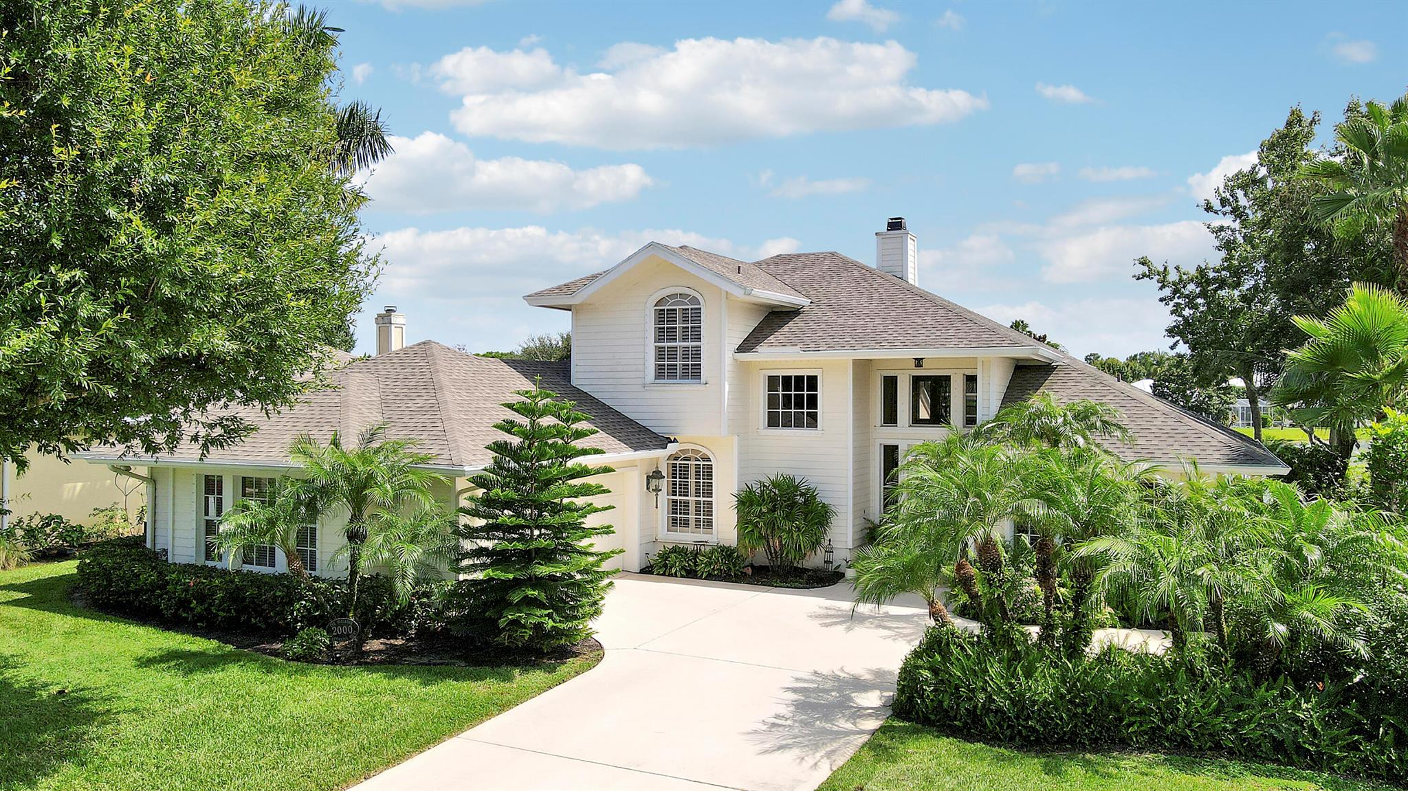 3 bedroom CBS lakefront home in highly desirable neighborhood of Danforth in Palm City. Bright and open entryway, wood burning fireplace and stacked guest bedrooms, primary suite upstairs. Oversized garage, screened in patio and large lot overlooking the lake. Walking/biking distance to Palm City schools - Palm City Elementary and Hidden Oaks Middle.