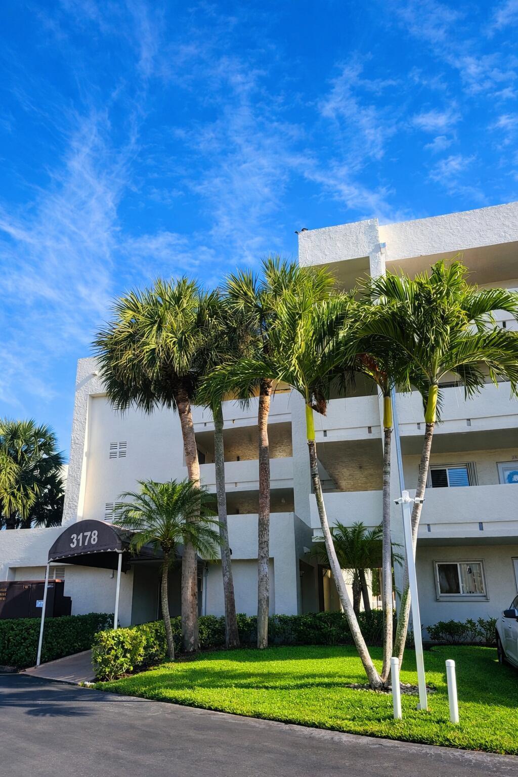 Photo of 3178 Via Poinciana #303, Lake Worth, FL 33467 (MLS # B26046142)