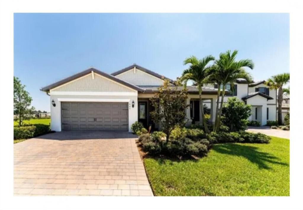 Photo of 447 SE Vallarta Drive, Port St Lucie, FL 34984 (MLS # R10868419)