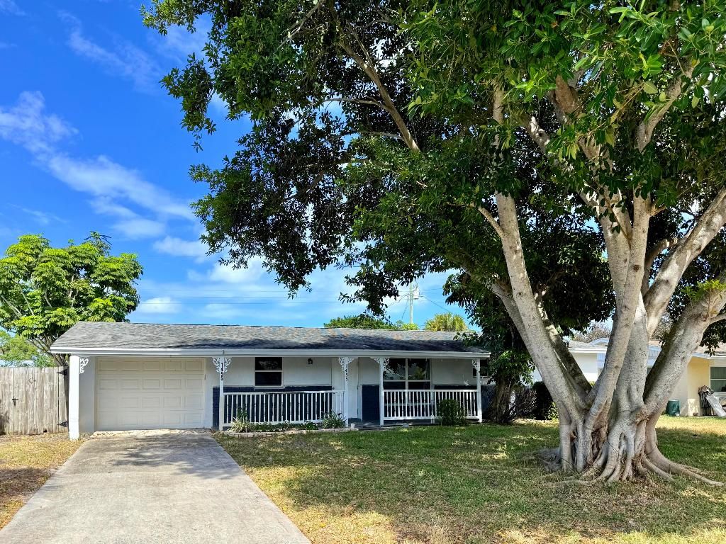 Photo of 1455 NE Silver Maple Way, Jensen Beach, FL 34957 (MLS # R11133792)