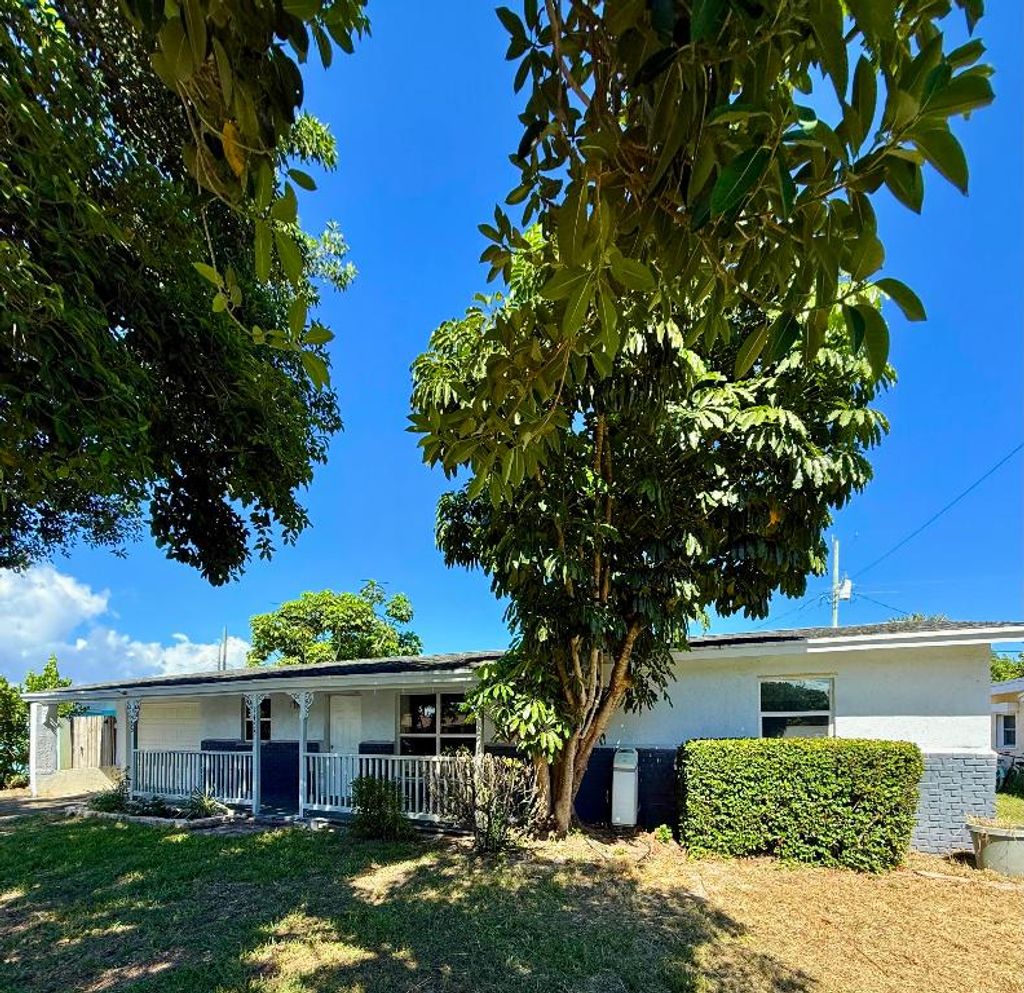 Photo of 1455 NE Silver Maple Way, Jensen Beach, FL 34957 (MLS # R11133792)