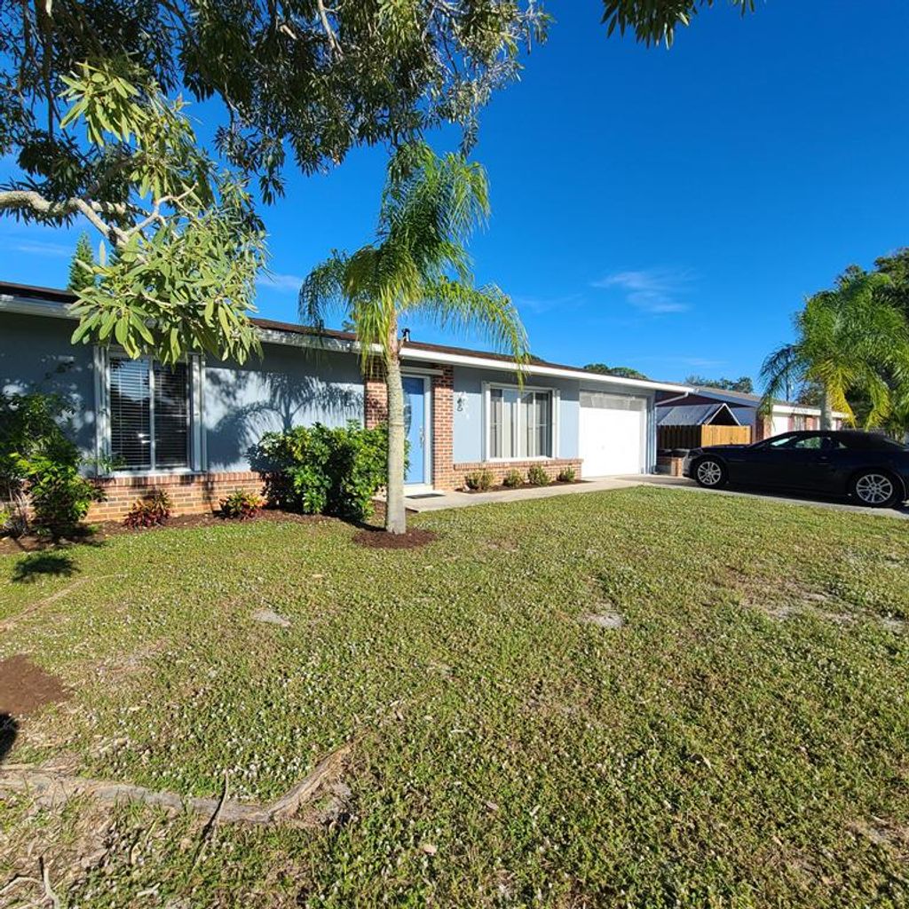 Photo of 489 SE Galleon Lane, Port Saint Lucie, FL 34983 (MLS # R10761469)