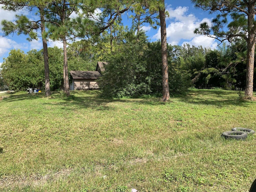 Photo of 11983 N 54th Street N, The Acreage, FL 33411 (MLS # R10977954)