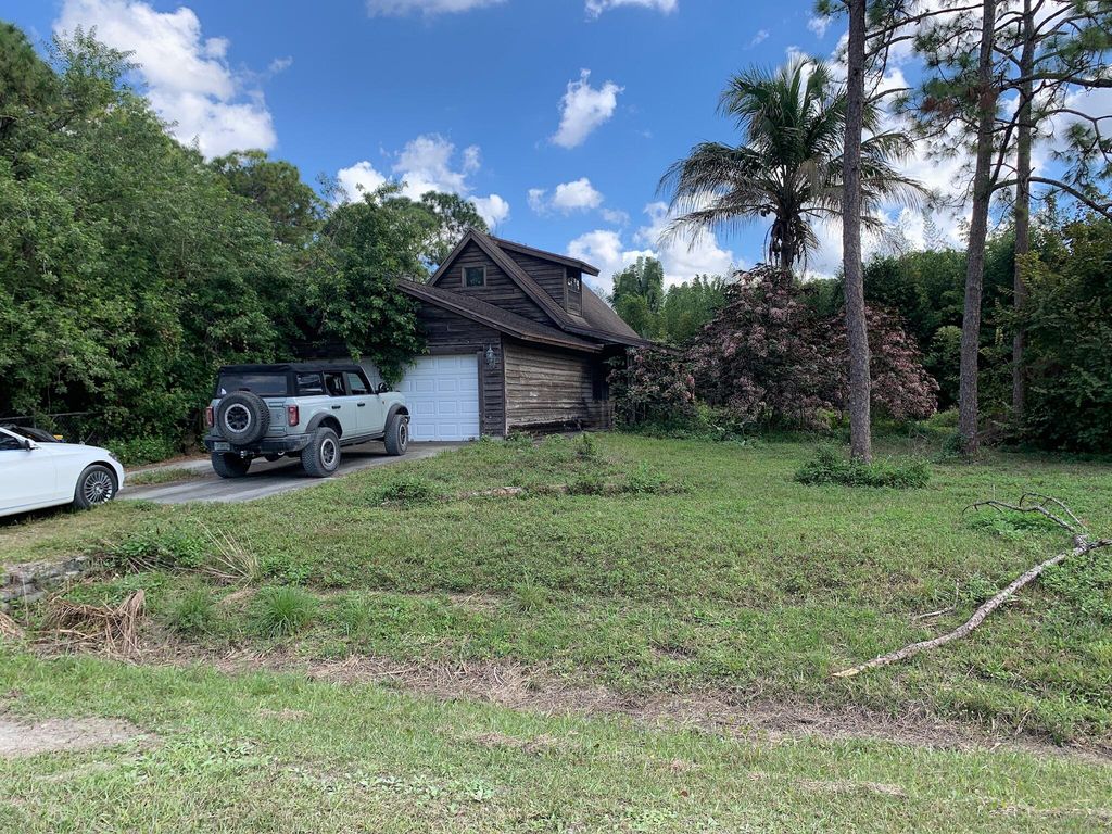 Photo of 11983 N 54th Street N, The Acreage, FL 33411 (MLS # R10977954)