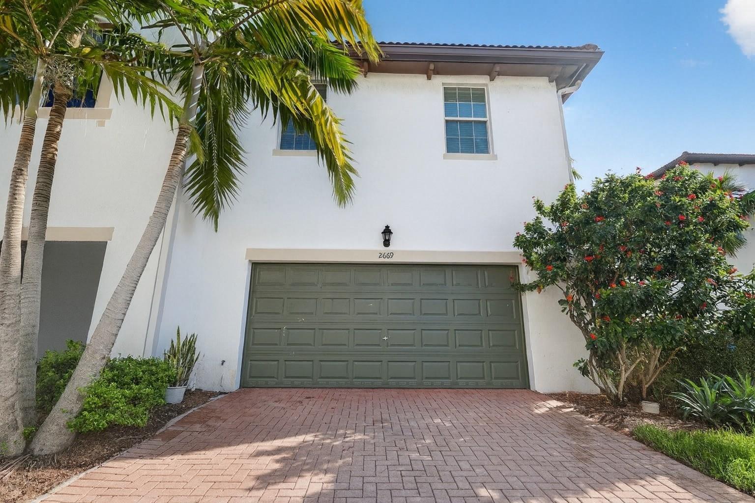 Don’t miss this beautifully maintained 3-bed, 2.5-bath corner townhome in Montclair, a gated community in Miramar. Nearly 2,000 sq ft of living space with high ceilings, an open layout, and a versatile loft ideal for an office, gym, or playroom. Features include Brazilian bamboo floors, carpet replaced 2 years ago, and a modernized primary bath (2025). The spacious master suite offers dual walk-in closets and a cozy sitting nook. Enjoy impact windows and doors, a 2-car garage with a new EV charger, and a driveway for two more cars. Pet- and kid-friendly community with pool, gym, and lake views. Conveniently located near I-75, Turnpike, top restaurants, shopping, and Memorial Miramar Hospital.